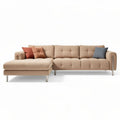 Canapé d'angle en tissu beige avec coussins décoratifs dimensions 250 x 90 x 85cm